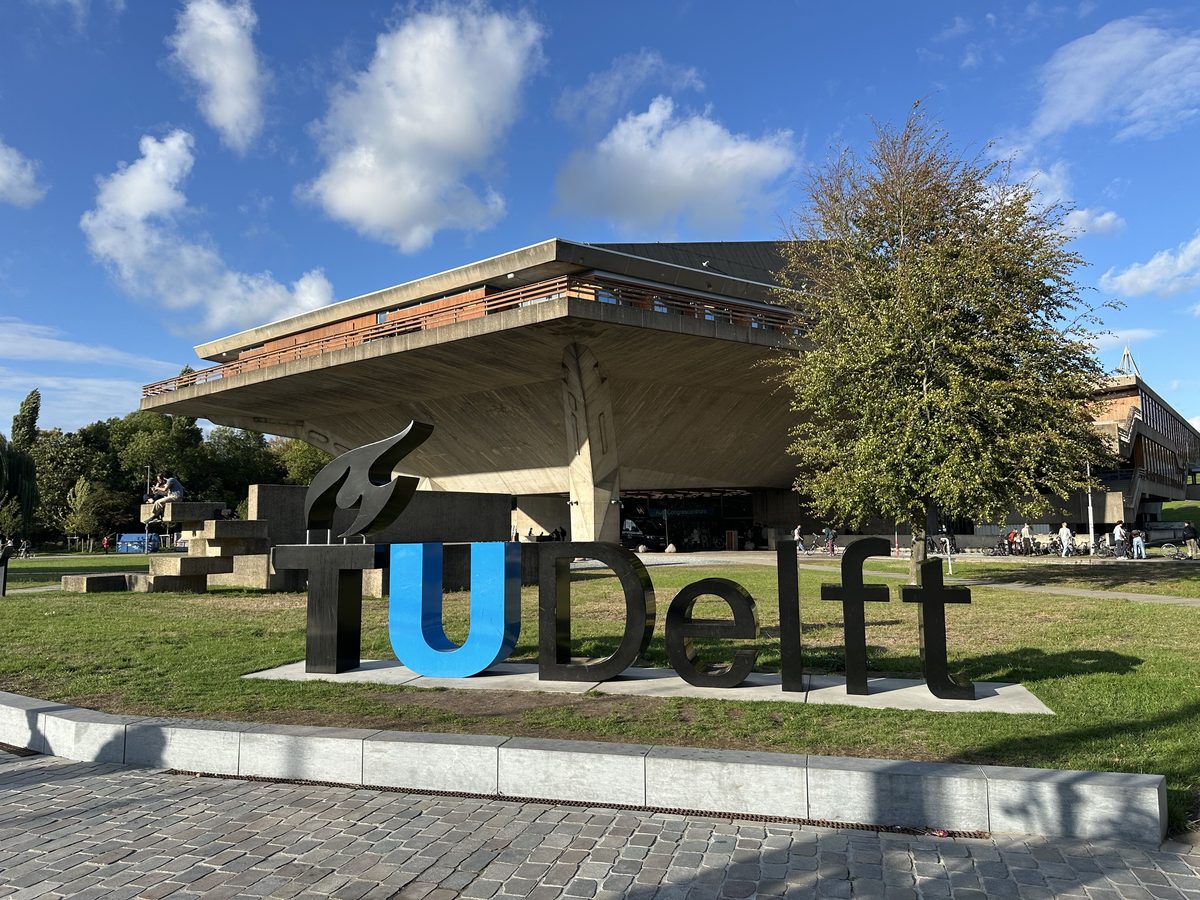 The TU Delft sign on the campus in Delft
